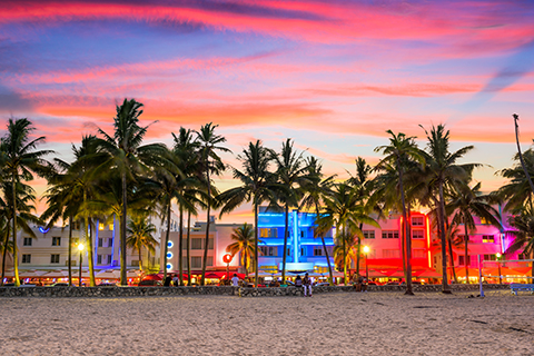 This is a stock photo. A city-scape view Collins Avenue on South Beach in Miami Beach, Florida.